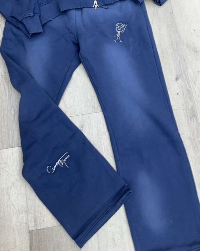 Blue pants with stick figure and signature.